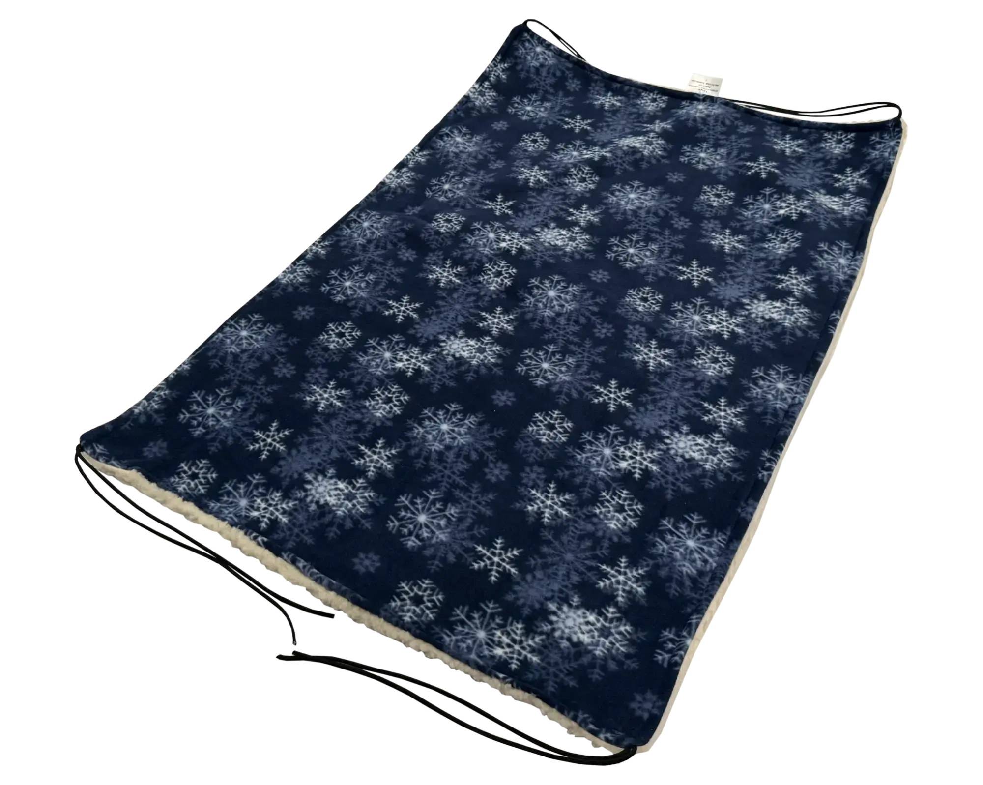 Photo of a GotchaBlanket with Blizzard fabric on one side and Cream fabric on the other.